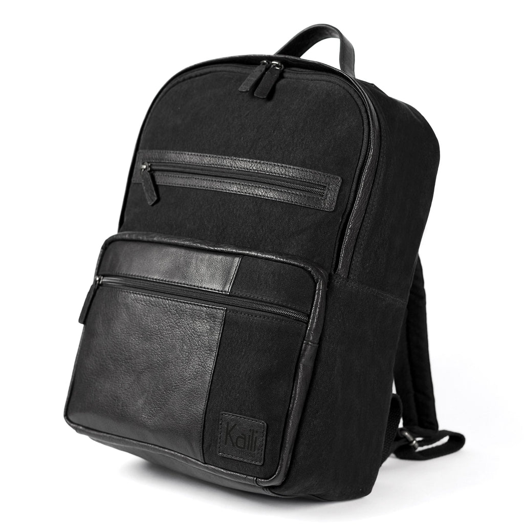 K0023AB | Zaino Porta Notebook in Canvas/Vera Pelle, pieno fiore, volanata - Colore Nero. Accessori Nickel Anticato, Chiusura con lampo. Dimensioni: cm 29 x 40 x15. Confezione: Sacchetto Tnt - drollido